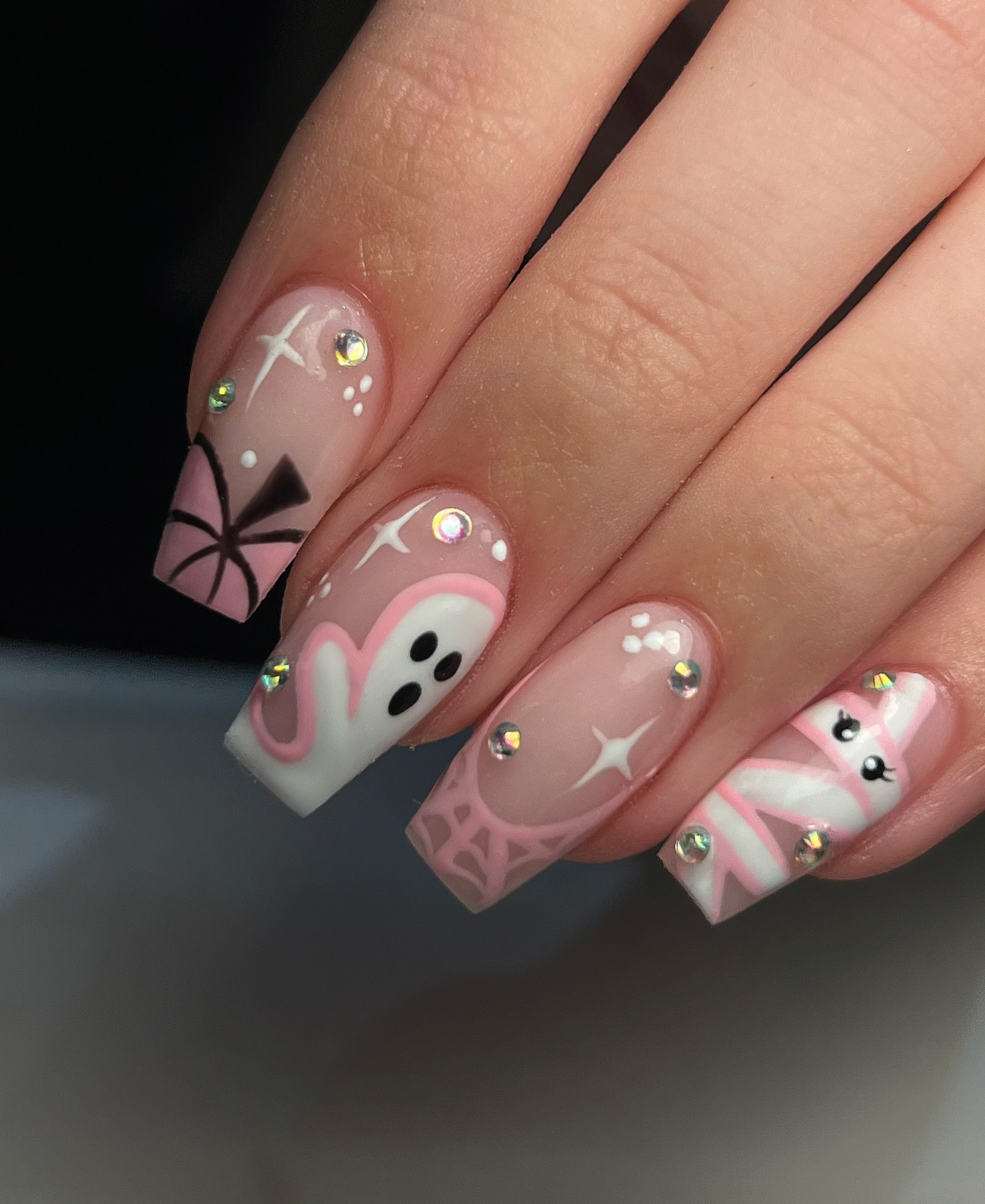 Pink ghost and spider web Halloween nails